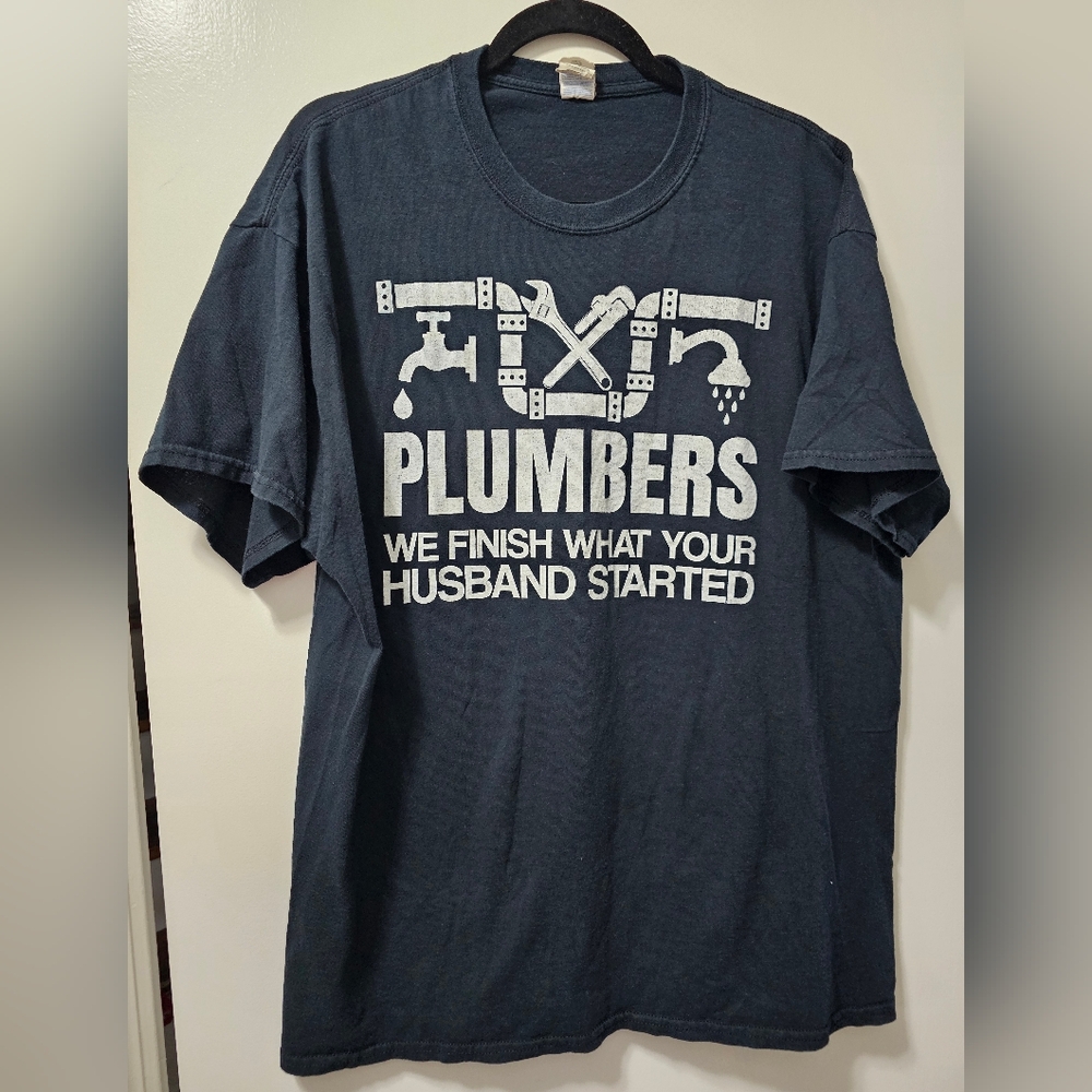 Unisex T-shirt "Plumbers- We Finish What Your Husbsnd Started"